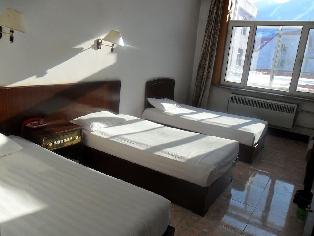 Yabuli Xintong Hotel Shangzhi Bilik gambar